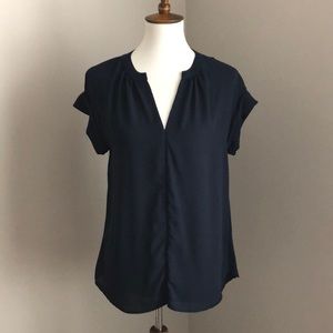 Navy blue sleeveless blouse